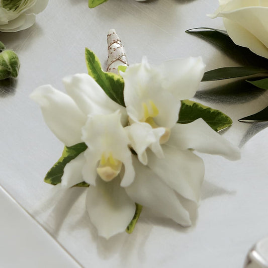 White Mini Cymbidium Boutonniere –  Mongis Luxe Creations Llc, Old Bridge NJ